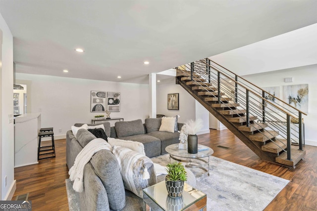 living room featuring dark hardwood / wood-style flooring