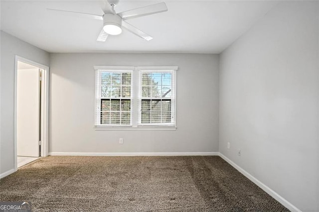 carpeted empty room with ceiling fan