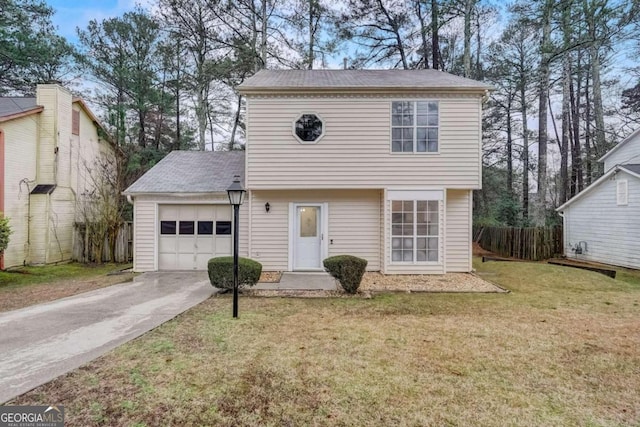 view of front facade featuring a front yard and a garage