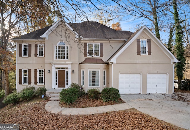 view of front of property with a garage