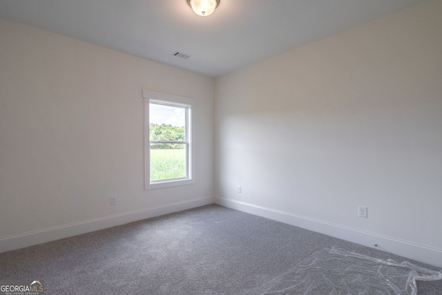 spare room with carpet flooring