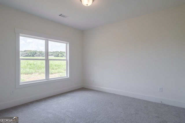 empty room featuring carpet