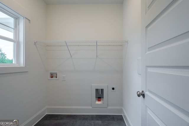 laundry room with washer hookup and electric dryer hookup