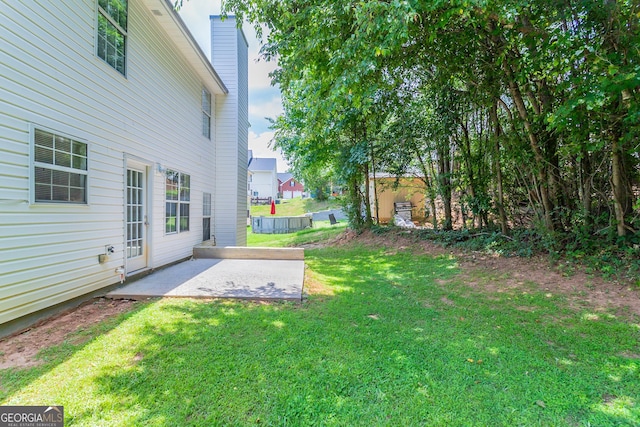 view of yard featuring a patio area