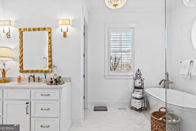 bathroom featuring a bathtub, tile flooring, and large vanity