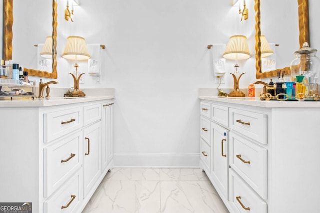 bathroom featuring tile flooring and vanity