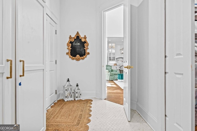 foyer entrance featuring light tile floors