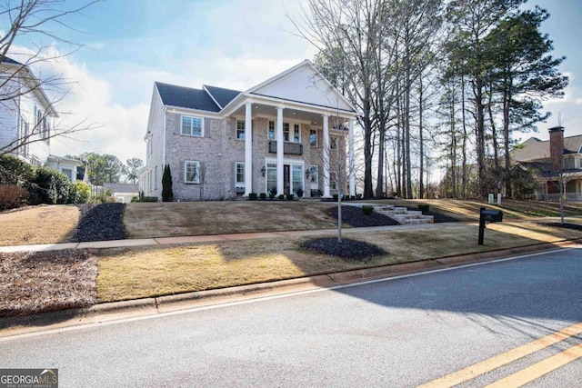 view of greek revival inspired property