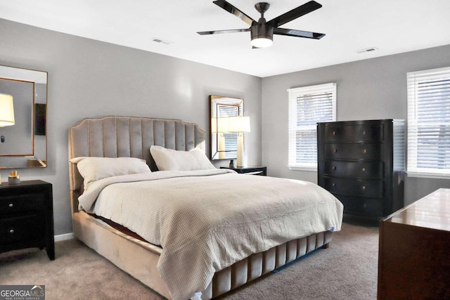 carpeted bedroom featuring ceiling fan