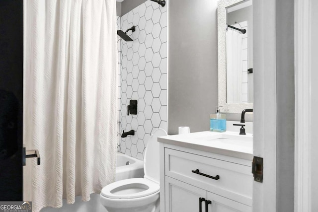 full bathroom with toilet, vanity, and shower / bath combo with shower curtain