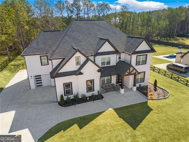 view of front of home featuring a front lawn