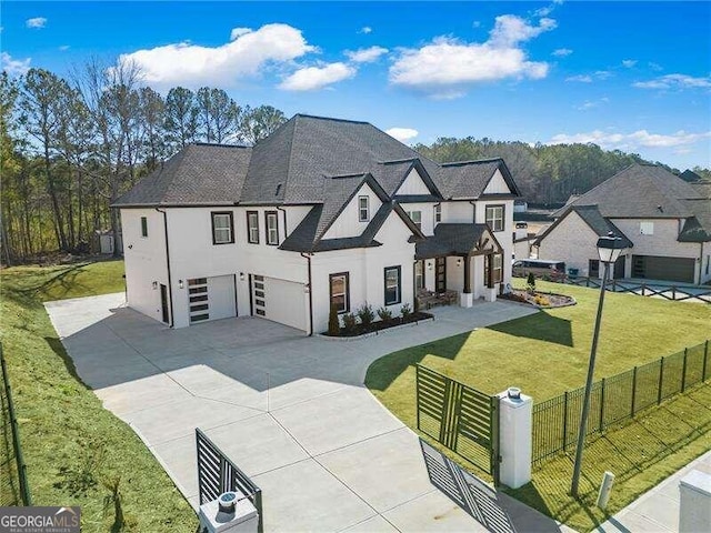 view of front of house with a patio and a front lawn