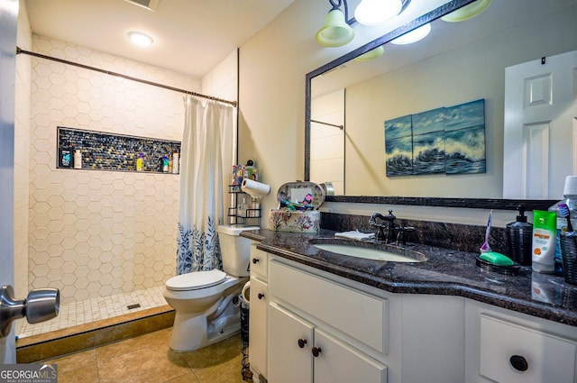 bathroom with tile flooring, toilet, large vanity, and a shower with shower curtain