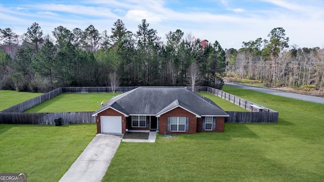 ranch-style home with a front yard and a garage