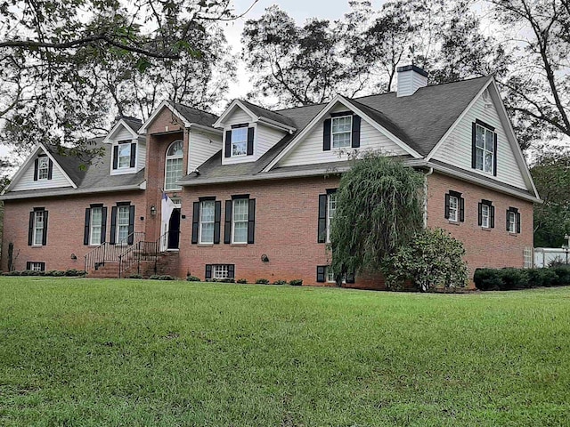 view of front of house with a front lawn