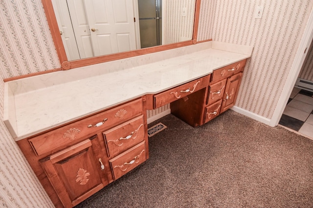 bathroom featuring tile floors and vanity