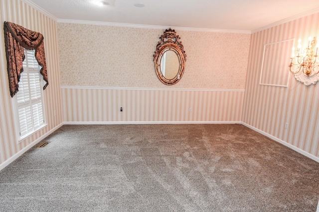 carpeted empty room with crown molding