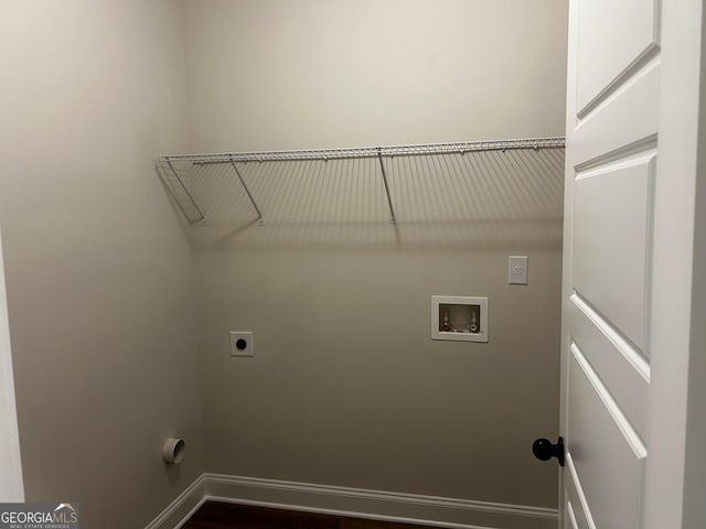 laundry area with laundry area, baseboards, washer hookup, and hookup for an electric dryer