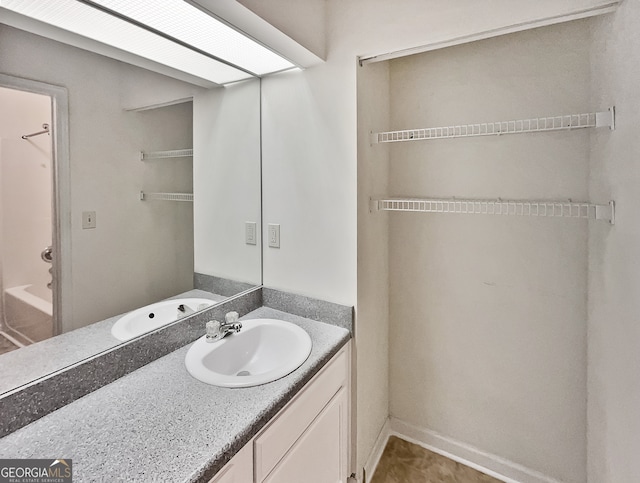 bathroom with  shower combination and vanity