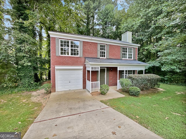 view of front of house featuring a porch, a garage, and a front lawn