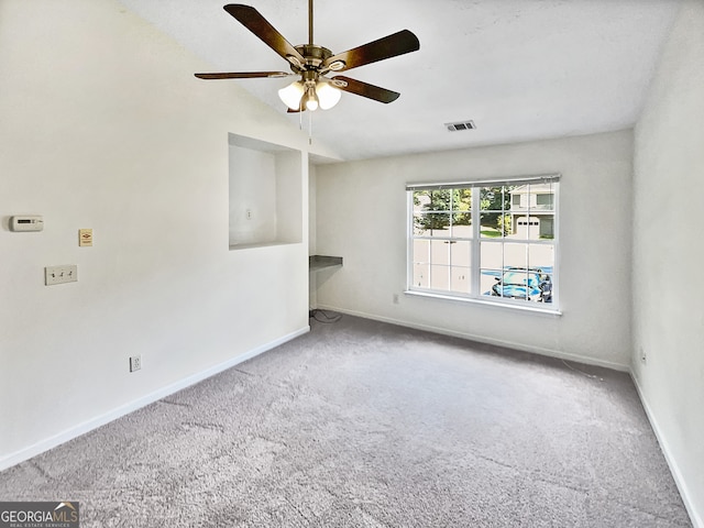 carpeted empty room with ceiling fan