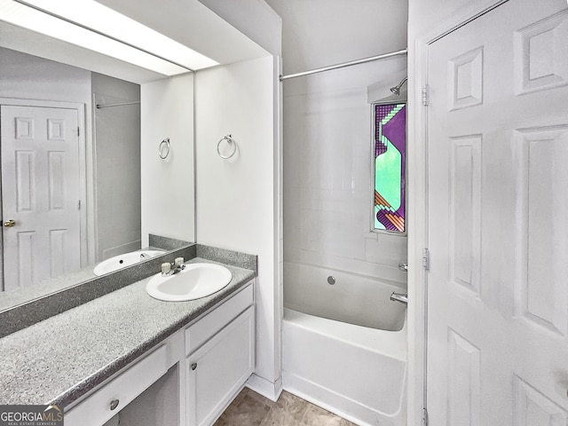 bathroom with vanity and shower / tub combination