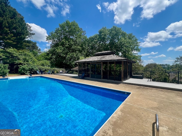 view of pool with a gazebo