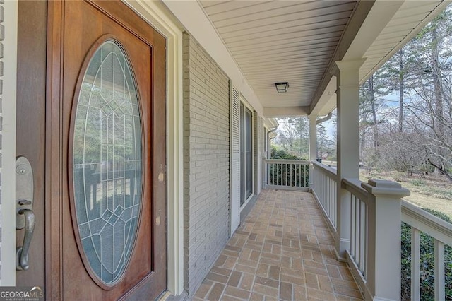 property entrance with a porch