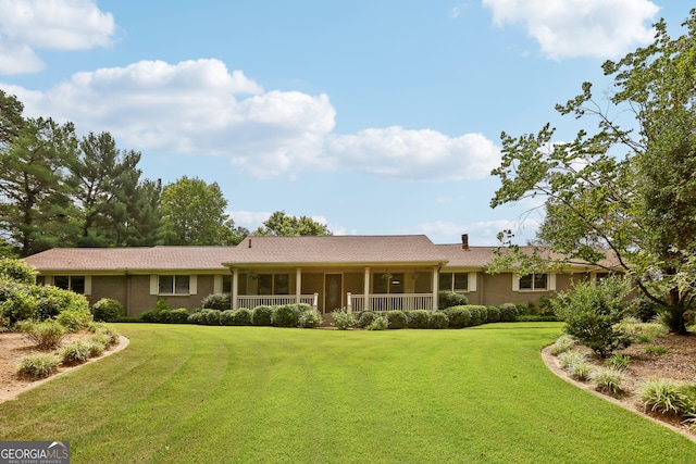 ranch-style house with a front yard