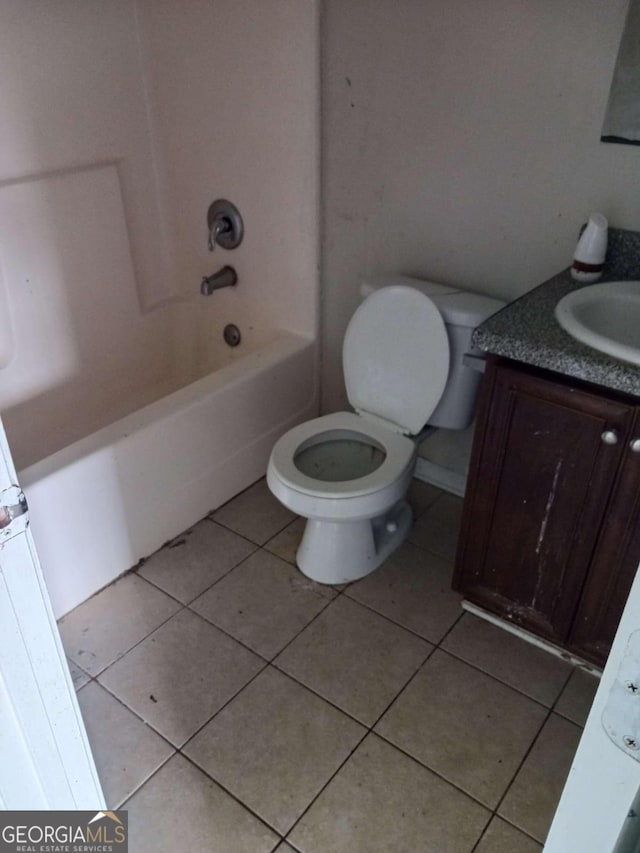 full bathroom with toilet, tile flooring, vanity, and shower / bath combination