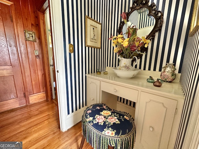 interior space with light wood-type flooring and vanity