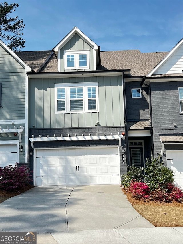 view of front of property with a garage