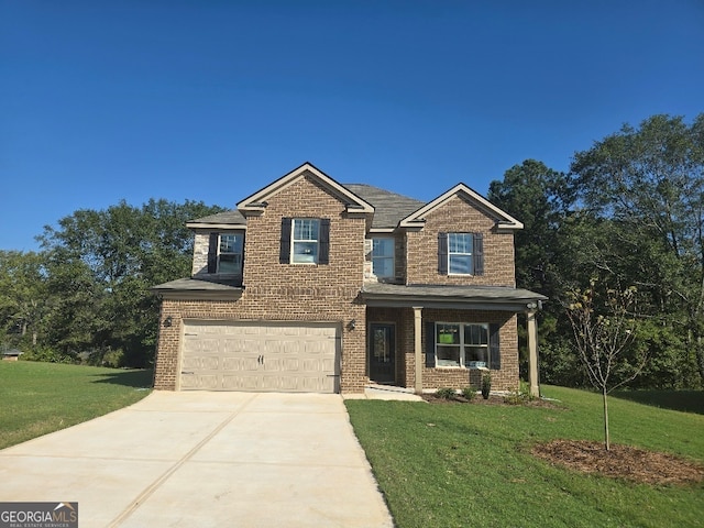 craftsman-style home featuring a garage and a front yard