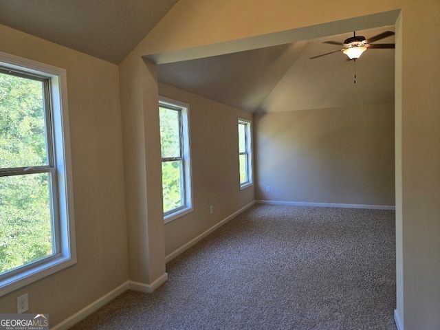 bonus room featuring lofted ceiling, ceiling fan, and carpet flooring