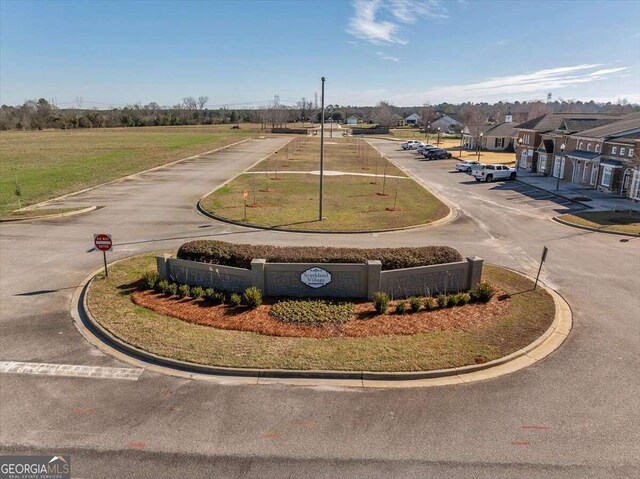 view of property's community with a water view