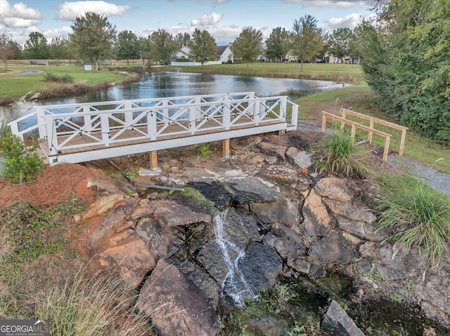 exterior space with a water view