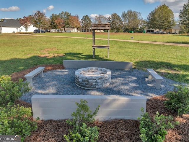 view of yard featuring a fire pit