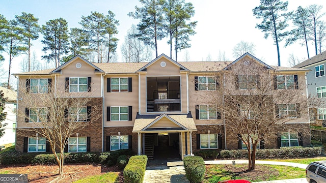 view of front of home with a balcony