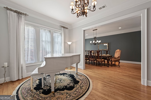 113 Hawks Ct, Ball Ground, GA 30107 - living area with a chandelier, ornamental molding, light wood-style floors, and recessed lighting