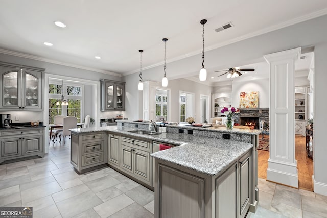 113 Hawks Ct, Ball Ground, GA 30107 - kitchen featuring gray cabinetry, a ceiling fan, healthy amount of natural light, recessed lighting, and crown molding