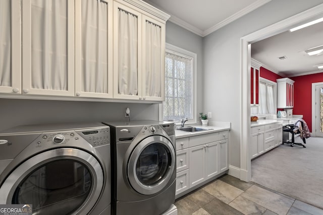 113 Hawks Ct, Ball Ground, GA 30107 - washroom with washing machine and dryer, cabinet space, ornamental molding, and light colored carpet