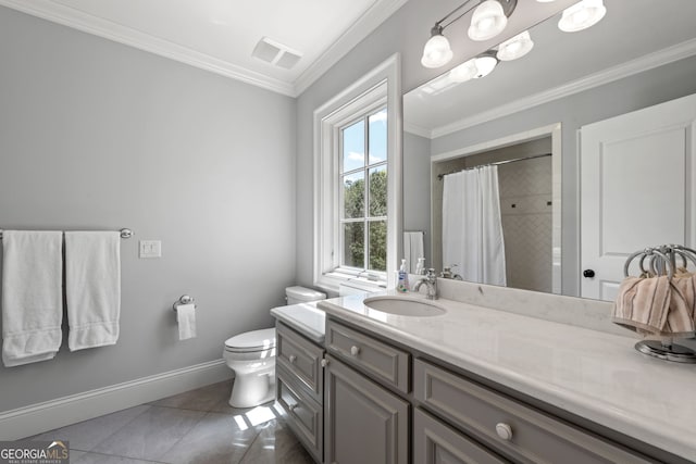 bathroom with tile flooring, vanity, toilet, and ornamental molding