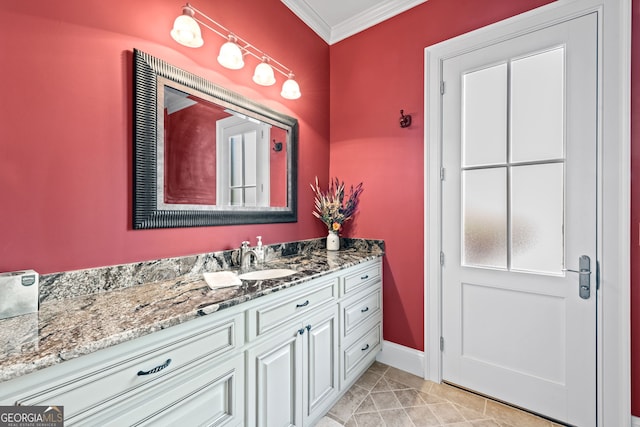 bathroom featuring crown molding, tile flooring, and vanity