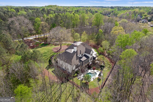113 Hawks Ct, Ball Ground, GA 30107 - view of subject property with a forest and a pool area