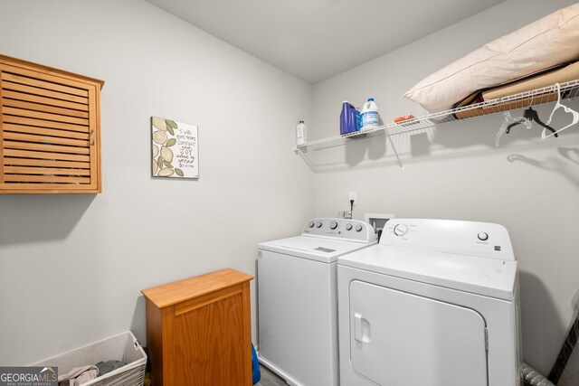 laundry area featuring washer and clothes dryer