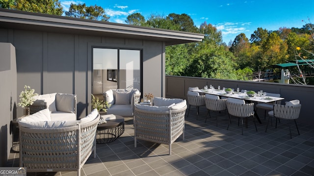 view of terrace featuring an outdoor living space