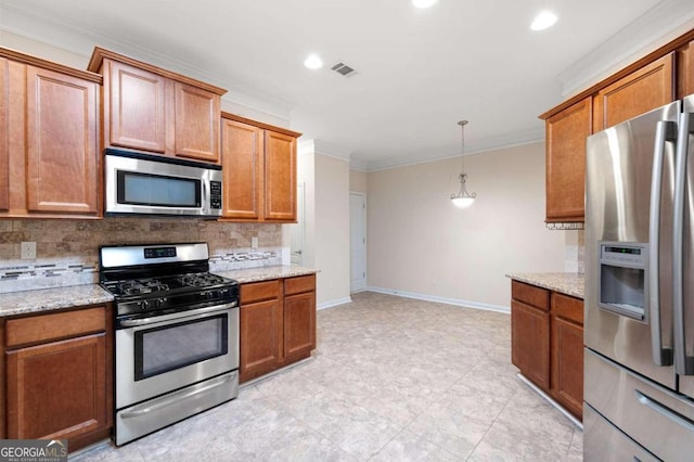 kitchen with backsplash, stainless steel appliances, and light stone counters