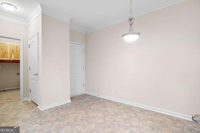 tiled spare room with ornamental molding