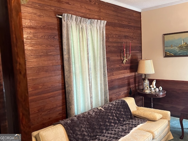 bedroom featuring wood walls and crown molding