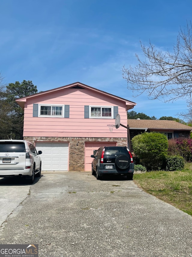 split level home with a garage